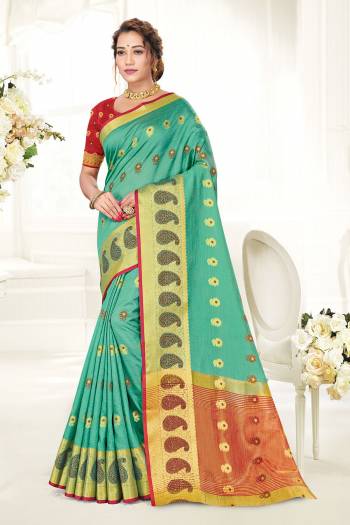 Looking This Traditional Saree Are Fine Saree Paired With Contrased Blouse.This Saree And Blouse Are Cotton Handloom Based Fabric With Heavy Wevon Designer Work. Buy This Pretty Saree Now.