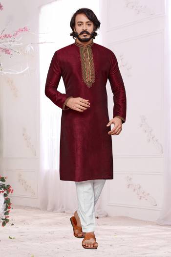 Attrective This Traditional Long Kurta Pant set is a must have in a men's ethnic wardrobe.This Kurta Are Art Silk Fabric And Pajama Is Cotton Fabric With Embroidery Work.