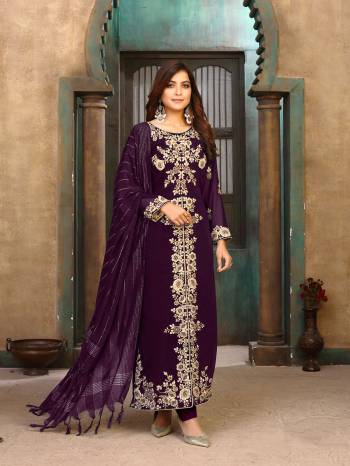 Looking This Designer Long Length Suit In Lovely Color.Its Pretty Heavy Designer Embroidery With Stone Work Top Is Faux Georgette Based Paired With Santoon Bottom And Jacquard Fabricated Dupatta Which Gives An Attractive To The Suit.