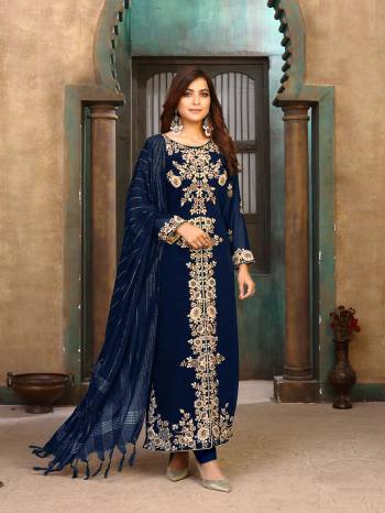 Looking This Designer Long Length Suit In Lovely Color.Its Pretty Heavy Designer Embroidery With Stone Work Top Is Faux Georgette Based Paired With Santoon Bottom And Jacquard Fabricated Dupatta Which Gives An Attractive To The Suit.