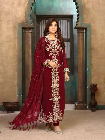 Looking This Designer Long Length Suit In Lovely Color.Its Pretty Heavy Designer Embroidery With Stone Work Top Is Faux Georgette Based Paired With Santoon Bottom And Jacquard Fabricated Dupatta Which Gives An Attractive To The Suit.