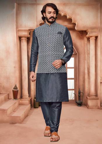 Take your ethnic style quotient to the next level by wearing this fashionable Modi Jacket. Tailored from finest Art Silk fabric With Lucknowi Embroidery Work and fashioned with a banded collar for a dash of style.