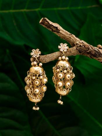 Give An Enhanced Look To Your Personality By Pairing Up This Beautiful Earring Set With Your Ethnic Attire. This Pretty Set Is In Gold Color Beautified With Kundan Work. Buy Now.