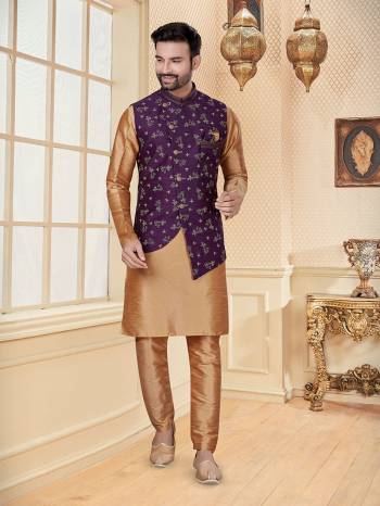 Take your ethnic style quotient to the next level by wearing this fashionable Jacket With Kurta Payajama. Tailored from finest Art Silk fabric With Designer Work and fashioned with a banded collar for a dash of style.