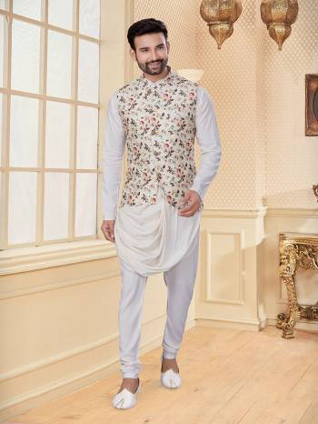 Take your ethnic style quotient to the next level by wearing this fashionable Jacket With Kurta Payajama. Tailored from finest Art Silk fabric With Designer Work and fashioned with a banded collar for a dash of style.