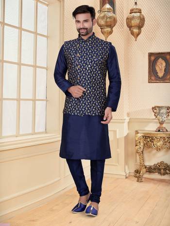 Take your ethnic style quotient to the next level by wearing this fashionable Jacket With Kurta Payajama. Tailored from finest Art Silk fabric With Designer Work and fashioned with a banded collar for a dash of style.