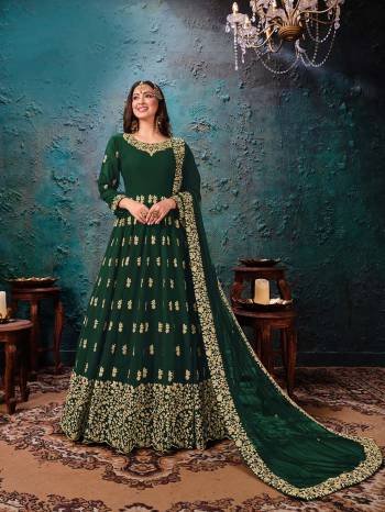 Looking This Designer Long Length Suit In Lovely Color.Its Pretty Heavy Designer Embroidery Work Top Is Faux Georgette Based Paired With Santoon Bottom And Net Fabricated Dupatta Which Gives An Attractive To The Suit.