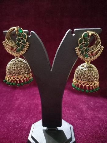 Give An Enhanced Look To Your Personality By Pairing Up This Beautiful Earring With Your Ethnic Attire. This Pretty Set Is In Golden Color Beautified With Oxodised Plating Work. Buy Now.