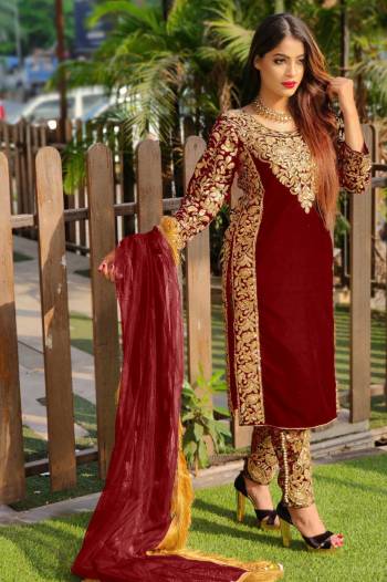 Attrective Look This Designer Long Length Suit In Lovely Color.Its Pretty Heavy Designer Embroidery With Stone Work Top Is Velvet Based Paired With Jacquard Bottom And Butterfly Net Fabricated Dupatta Which Gives An Attractive To The Suit.