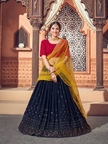 Garb This Wedding Partywear Heavy Designer Lehenga Choli And Dupatta In Fine Color Fabricated On Georgette Beautified With Heavy Attractive Thread,Sequance Embroidery Work. 