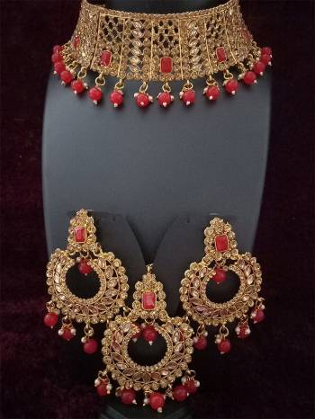 An Enhanced Look To Your Personality By Pairing Up This Beautiful Necklace Set With Your Ethnic Attire. This Pretty Set Is In Golden Color Beautified With Amond,Kundan And Pearl MotiWork. Buy Now.