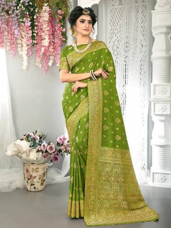 Garb This Stylist Partywear Saree Are Fine Saree Paired With Blouse.This Saree And Blouse Are Fancy Silk Fabric With Heavy Designer Wevon Work. Buy This Pretty Saree Now.