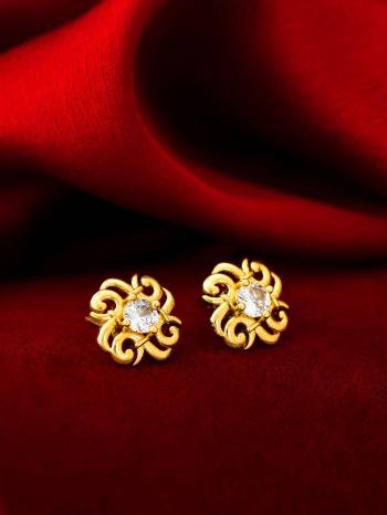 Give An Enhanced Look To Your Personality By Pairing Up This Beautiful Earring With Your Ethnic Attire. This Pretty Set Is In Gold Color Beautified With Floral Stud Work. Buy Now.