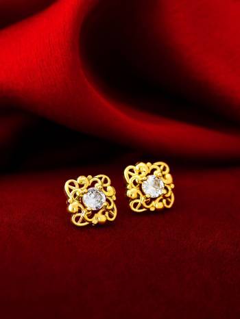 Give An Enhanced Look To Your Personality By Pairing Up This Beautiful Earring With Your Ethnic Attire. This Pretty Set Is In Gold Color Beautified With Floral Stud Work. Buy Now.