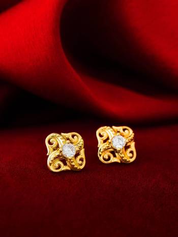 Give An Enhanced Look To Your Personality By Pairing Up This Beautiful Earring With Your Ethnic Attire. This Pretty Set Is In Gold Color Beautified With Floral Stud Work. Buy Now.