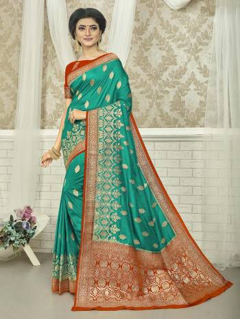 Garb This Stylist Partywear Saree Are Fine Saree Paired With Blouse.This Saree And Blouse Are Fancy Silk Fabric With Heavy Designer Wevon Work. Buy This Pretty Saree Now.