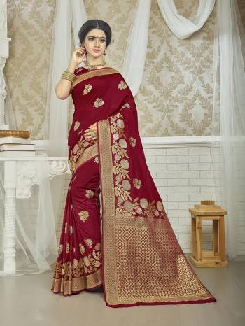 Garb This Stylist Partywear Saree Are Fine Saree Paired With Blouse.This Saree And Blouse Are Fancy Silk Fabric With Heavy Designer Wevon Work. Buy This Pretty Saree Now.