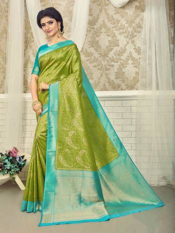 Garb This Stylist Partywear Saree Are Fine Saree Paired With Blouse.This Saree And Blouse Are Fancy Silk Fabric With Heavy Designer Wevon Work. Buy This Pretty Saree Now.