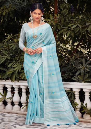Looking This Traditional Saree Are Fine Saree Paired With Blouse.This Saree And Blouse Are Linen Based Fabric With Heavy Wevon Designer Work. Buy This Pretty Saree Now.