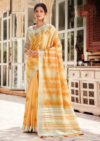 Looking This Traditional Saree Are Fine Saree Paired With Blouse.This Saree And Blouse Are Linen Based Fabric With Heavy Wevon Designer Work. Buy This Pretty Saree Now.