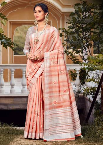 Looking This Traditional Saree Are Fine Saree Paired With Blouse.This Saree And Blouse Are Linen Based Fabric With Heavy Wevon Designer Work. Buy This Pretty Saree Now.