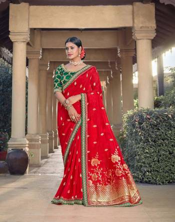 Looking This Traditional Partywear Saree Are Fine Saree Paired With Contrasted Blouse.This Saree Are Viscose Silk And Blouse Are Raw Silk Fabric With Heavy Weaving Designer And Embroidery Work. Buy This Pretty Saree Now.