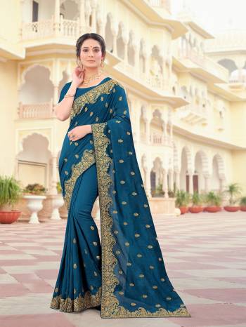 Attrective Look This Traditionl Partywear Saree Are Fine Saree Paired With Blouse.This Saree And Blouse Are Two Tone Vichitra Silk Based Fabric With Heavy Designer Jari Embroidery,Stone Work. Buy This Pretty Saree Now.