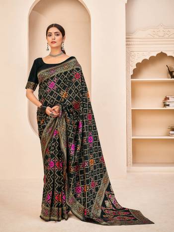 Look Attrective This Wedding Partywear Saree Are Fine Saree Paired With Blouse.This Saree And Blouse Are Banarasi Silk Based Fabric With Weaving Patola Designer Work. Buy This Pretty Saree Now.