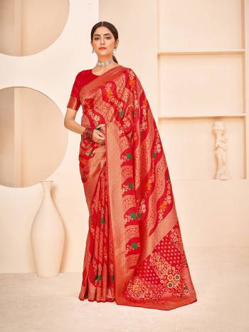 Look Attrective This Wedding Partywear Saree Are Fine Saree Paired With Blouse.This Saree And Blouse Are Banarasi Silk Based Fabric With Weaving Patola Designer Work. Buy This Pretty Saree Now.