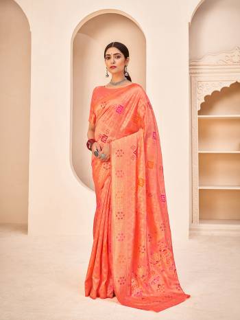 Look Attrective This Wedding Partywear Saree Are Fine Saree Paired With Blouse.This Saree And Blouse Are Banarasi Silk Based Fabric With Weaving Patola Designer Work. Buy This Pretty Saree Now.