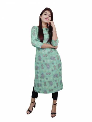 Garb This Readymade Long Kurti In Fine Color Fabricated On Rayon Beautified With Designer Printed. It Is Light In Weight And Easy To Carry All Day Long. 