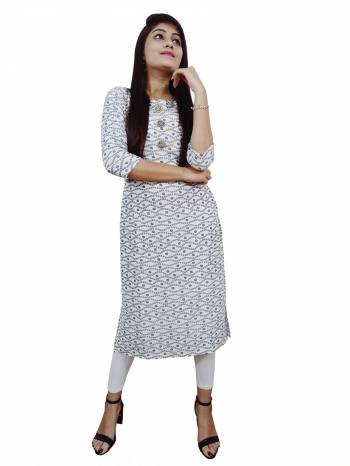 Garb This Readymade Long Kurti In Fine Color Fabricated On Rayon Beautified With Designer Printed. It Is Light In Weight And Easy To Carry All Day Long. 