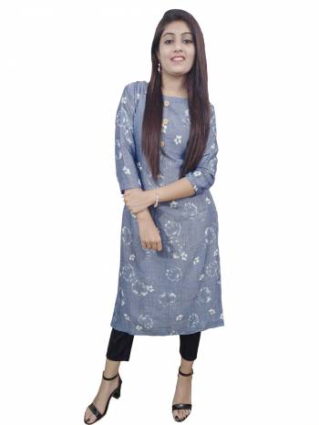 Garb This Readymade Long Kurti In Fine Color Fabricated On Rayon Beautified With Designer Printed. It Is Light In Weight And Easy To Carry All Day Long. 