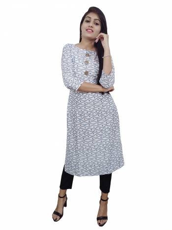 Garb This Readymade Long Kurti In Fine Color Fabricated On Rayon Beautified With Designer Printed. It Is Light In Weight And Easy To Carry All Day Long. 