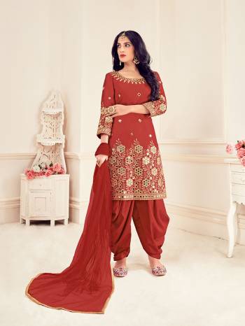 Looking This Designer Long Length Suit In Lovely Color.Its Pretty Heavy Designer Real Mirror Embroidery Work Top Is Bitalian Soft Silk Based Paired With Bitalian Soft Silk Bottom And Net Fabricated Dupatta Which Gives An Attractive To The Suit.