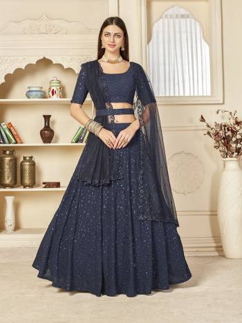 Garb This Wedding Partywear Heavy Designer Lehenga Choli And Dupatta In Fine Color Fabricated On Georgette Beautified With Heavy Attractive Thread,Sequance Embroidery Work And Belt .