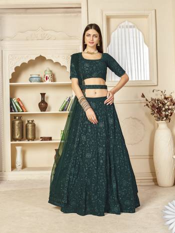 Garb This Wedding Partywear Heavy Designer Lehenga Choli And Dupatta In Fine Color Fabricated On Georgette Beautified With Heavy Attractive Thread,Sequance Embroidery Work And Belt .