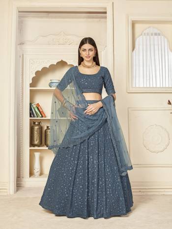 Garb This Wedding Partywear Heavy Designer Lehenga Choli And Dupatta In Fine Color Fabricated On Georgette Beautified With Heavy Attractive Thread,Sequance Embroidery Work And Belt .