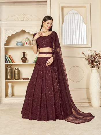 Garb This Wedding Partywear Heavy Designer Lehenga Choli And Dupatta In Fine Color Fabricated On Georgette Beautified With Heavy Attractive Thread,Sequance Embroidery Work And Belt .