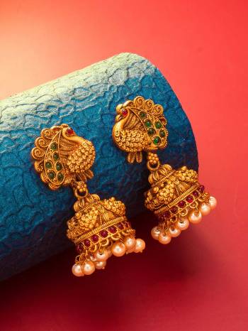 Attrective Give An Enhanced Look To Your Personality By Pairing Up This Beautiful Earring Set With Your Ethnic Attire. This Pretty Set Is In Gold Color Beautified With Stone And Pearl Work. Buy Now.