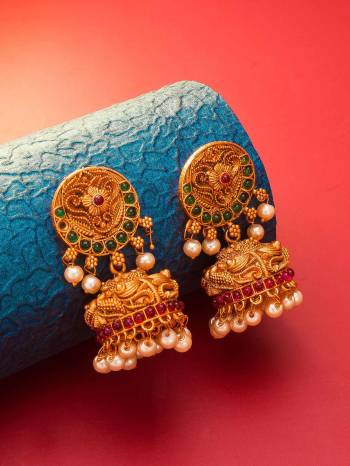 Attrective Give An Enhanced Look To Your Personality By Pairing Up This Beautiful Earring Set With Your Ethnic Attire. This Pretty Set Is In Gold Color Beautified With Stone And Pearl Work. Buy Now.