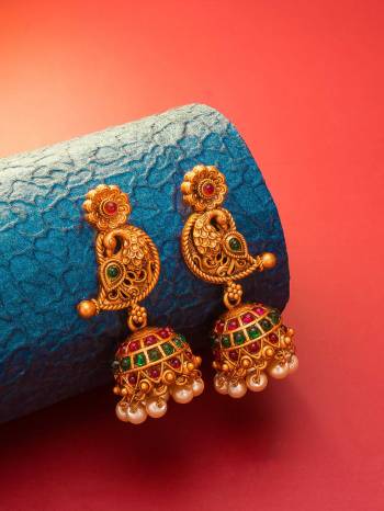 Attrective Give An Enhanced Look To Your Personality By Pairing Up This Beautiful Earring Set With Your Ethnic Attire. This Pretty Set Is In Gold Color Beautified With Stone And Pearl Work. Buy Now.