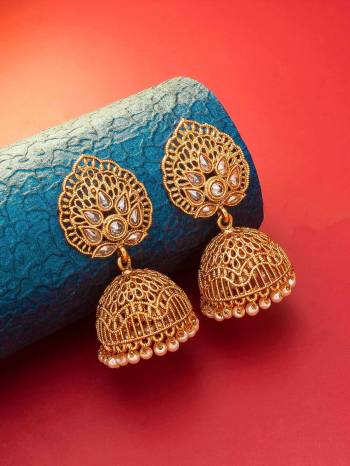 Attrective Give An Enhanced Look To Your Personality By Pairing Up This Beautiful Earring Set With Your Ethnic Attire. This Pretty Set Is In Gold Color Beautified With Kundan Work. Buy Now.