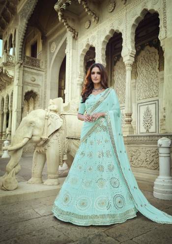 Look Attrective This Wedding Partywear Heavy Designer Lehenga Choli And Dupatta In Fine Color Fabricated On Georgette Beautified With Heavy Attractive Thread,Sequance Embroidery Work. 