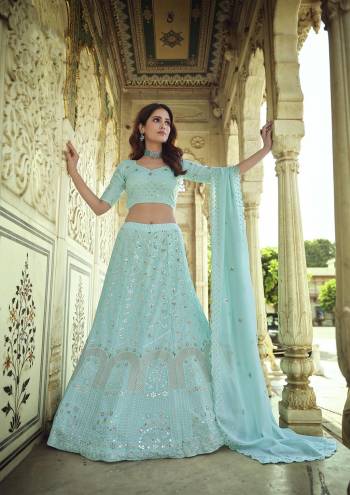 Look Attrective This Wedding Partywear Heavy Designer Lehenga Choli And Dupatta In Fine Color Fabricated On Georgette Beautified With Heavy Attractive Thread,Sequance Embroidery Work. 