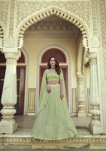 Look Attrective This Wedding Partywear Heavy Designer Lehenga Choli And Dupatta In Fine Color Fabricated On Georgette Beautified With Heavy Attractive Thread,Sequance Embroidery Work. 