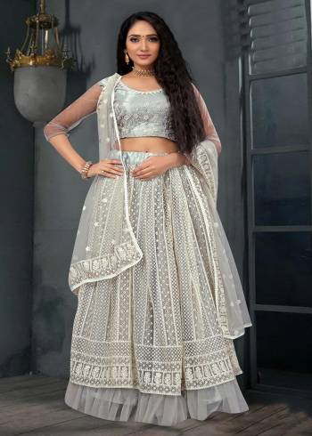 Attrective Heavy Designer Lehenga Choli In Fine Color Fabricated On Net And Dupatta Are Net Beautified With Heavy Attractive Lukhnawi Embroidery Work. 