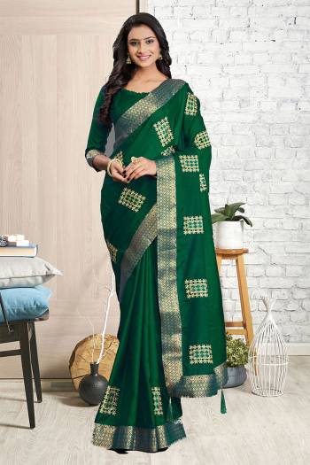 Garb This Traditionl Partywear Saree Are Fine Saree Paired With Blouse.This Saree And Blouse Are Silk Cotton Based Fabric With Heavy Designer Embroidery Work. Buy This Pretty Saree Now.