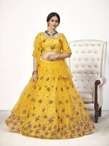 Looking This Wedding Partywear Heavy Designer Lehenga Choli And Dupatta In Fancy Color Fabricated On Soft Net Beautified With Heavy Attractive Thread,Sequance Embroidery Work. 