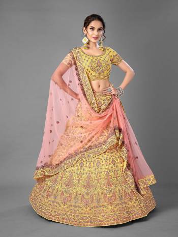 Look Attrective This Wedding Partywear Heavy Designer Lehenga Choli And Dupatta In Fine Color Fabricated On Georgette Beautified With Heavy Attractive Embroidery Work. 